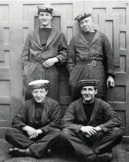  ??  ?? Royal Navy stokers in their overalls, circa 1914