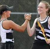  ?? ?? Jenna Bell, left, and Carolina Walters from Latrobe defeated Elana Sobol and Rachel Nath of Shady Side Academy 6-3, 6-3.