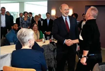  ?? BOB RAINES — DIGITAL FIRST MEDIA ?? Gov. Tom Wolf visits a class for new employees on his tour of Accolade in Plymouth Meeting Thursday.