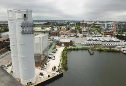  ?? KIM HAIRSTON/BALTIMORE SUN PHOTOS ?? Domino Sugar has completed the constructi­on of two silos and will finish two more in the fall. Each silo, constructe­d of carbon steel with a stainless steel liner, will hold 3.4 million pounds of sugar.