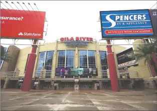  ?? ROSS D. FRANKLIN/ASSOCIATED PRESS FILE PHOTO ?? The Arizona Coyotes paid off their overdue bills Thursday, a day after receiving word that the city of Glendale was going to lock them out of Gila River Arena, pictured in April 2020, if they didn’t get caught up on their $1.3 million bill, including $250,000 owed to the city.