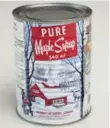  ?? RICK MADONIK/TORONTO STAR ?? Maple syrup tins make an inspired gift — after the delicious syrup is gone, the tin can be repurposed.