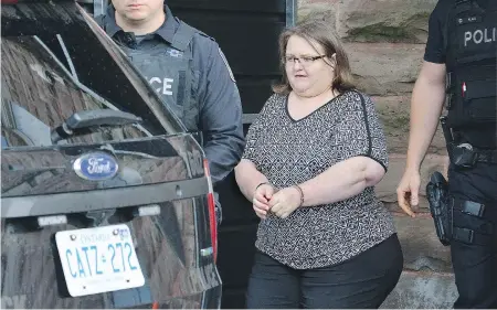  ??  ?? MORRIS LAMONT/THE LONDON FREE PRESS Elizabeth Wettlaufer, the former seniors’ home nurse who was convicted in the murder of eight elderly people under her care in Woodstock, Ont., leaves the Oxford County Court House after being sentenced to life in...