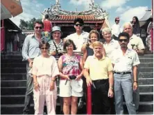  ??  ?? the writer (back row, centre) and ramli (right) with their australian tour group at the Snake temple in penang in 1988.