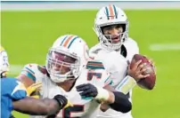  ?? JOHN MCCALL| SOUTH FLORIDASUN SENTINEL ?? Tua Tagovailoa looks to throw against the Chargers at Hard Rock Stadium on Sunday.