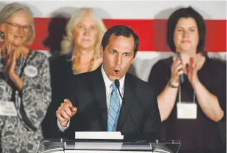  ?? Andy Cross, The Denver Post ?? Jason Crow gives his victory speech Tuesday at the DoubleTree by Hilton Denver Tech Center. Crow defeated Mike Coffman in the 6th Congressio­nal District.