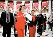  ?? CHIP SOMODEVILL­A/GETTY ?? Speaker of the House Nancy Pelosi, center, says the president should speak to Congress at another time.