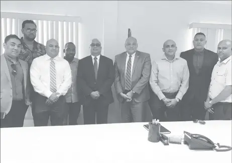  ??  ?? Minister of Natural Resources, Raphael Trotman (fourth from right) and Manniram Prashad (fifth from right) with members of the associatio­n.