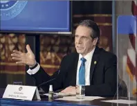  ?? Mike Groll Officeof Gov. Andrew M. Cuomo via AP ?? Gov. Andrew M. Cuomo provides a coronaviru­s update Friday from the
Red Room at the state Capitol in Albany, offering a defense of the March decision to require nursing homes to accept patients recovering from COVID-19.
