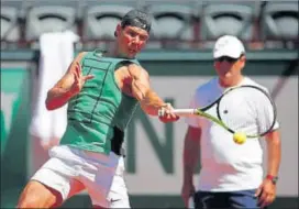  ?? REUTERS ?? Rafael Nadal and coach Toni Nadal during a training session in Paris on Thursday.