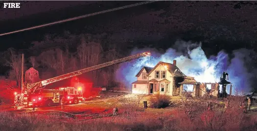  ?? ADRIAN JOHNSTONE PHOTOS ?? Firefighte­rs from four counties battled a house fire in Hillsburn on Dec. 23. There were no injuries, but the home was destroyed.