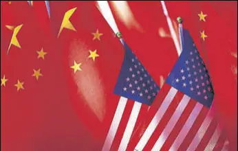  ?? AP ?? In a file photo, China and US flags are seen displayed together, in Beijing.