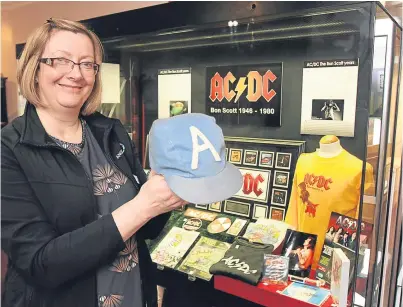  ?? Picture: Gareth Jennings. ?? Rachel Jackson with Angus Young’s cap from 1976.