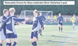  ??  ?? Newcastle School for Boys celebrate Oliver Mullarkey’s goal