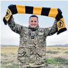  ?? ?? Planting the flag: Dan Mcnamara in a ‘top secret’ location overseas with the RAF