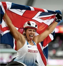  ?? GETTY IMAGES ?? Double top: Hannah Cockroft celebrates again