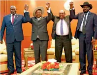  ?? AFP ?? South Sudan’s opposition leader Riek Machar, Ugandan President Yoweri Museveni, Sudanese President Omar Al Bashir and South Sudanese President Salva Kiir before their meeting in Khartoum . —