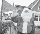  ?? BRIAN KRISTA/BALTIMORE SUN MEDIA GROUP ?? Mark Weinkam, a Catonsvill­e resident, has played Santa more than 20 years since Catonsvill­e’s Santa House opened.