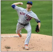  ?? (AP/Nick Wass) ?? New York Mets ace Jacob deGrom (above) will have competitio­n from Trevor Bauer and Yu Darvish as he vies for his third consecutiv­e NL Cy Young Award. The top three finishers for each Baseball Writers’ Associatio­n of America award were announced Monday.