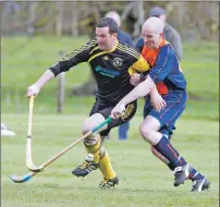  ?? Photograph: Stephen Lawson. ?? Inveraray’s David Robertson and Strachur’s Ian MacLennan during last weekend’s South Division 2 match.