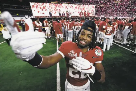  ?? Tom Pennington / Getty Images ?? Najee Harris celebrates after Alabama beat Notre Dame 3114 in the Rose Bowl game to earn a trip to the national title game.