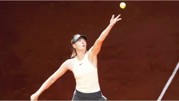  ?? — Reuters photo ?? Russia’s Maria Sharapova in action against Romania’s Mihaela Buzarnescu during their round of 64 match.