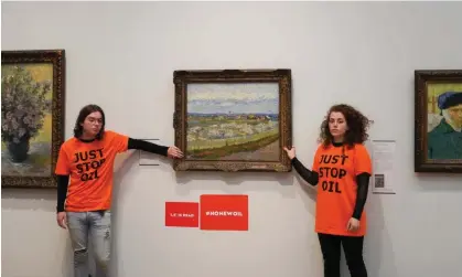  ?? Photograph: Kristian Buus/In Pictures/Getty Images ?? Just Stop Oil activists Louis McKechnie and Emily Brockleban­k glue themselves to Van Gogh’s Peach Trees in Blossom at the Courtauld Gallery on 30 June.