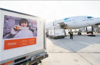  ?? Indonesia Presidenti­al Palace ?? An experiment­al coronaviru­s vaccine made by the Chinese pharmaceut­ical company Sinovac is readied for loading this month onto a plane from Indonesia at Beijing Internatio­nal Airport.