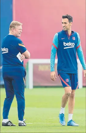  ?? FOTO: PERE PUNTÍ ?? Koeman y Busquets El canterano ha sido un jugador básico para el técnico