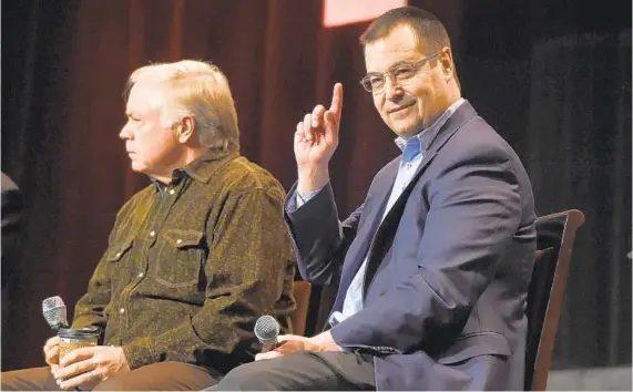  ?? KIM HAIRSTON/BALTIMORE SUN ?? Manager Buck Showalter, left, and executive vice president Dan Duquette answer questions from season-ticket holders at the Orioles FanFest at the Baltimore Convention Center.