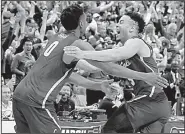  ?? AP/TONY GUTIERREZ ?? Loyola-Chicago guards Donte Ingram (left) and Marques Townes celebrate after Ingram’s last-second three-pointer gave the Ramblers a 64-62 victory over the Miami Hurricanes on Thursday in the South Region of the NCAA Tournament in Dallas.