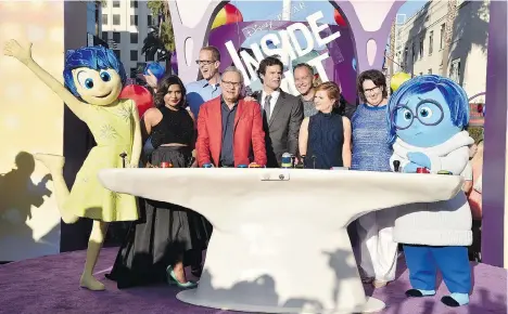  ?? KEVIN WINTER/GETTY IMAGES ?? From left, Mindy Kaling, Pete Docter, Lewis Black, Bill Hader, Jonas Rivera, Amy Poehler and Phyllis Smith attend the L.A. premiere of Inside Out.