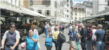  ??  ?? With flower-bedecked windows and a buzzing produce market, Bolzano feels equally Austrian and Italian.