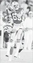  ??  ?? Hall of Fame receiver Jerry Rice, holder of more than 100 NFL records during a three Super Bowl, 13-year Pro Bowl career, caught his record 101st touchdown, 26 years ago today.