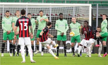  ?? Photograph: Matteo Bazzi/EPA ?? Hakan Calhanoglu starts Milan’s comeback win against Celtic with their first goal of the match.