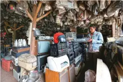  ??  ?? JAKARTA: In this Friday, Jan 13, 2017, photo, a customer looks at a used tape recorder at a flea market on the outskirts of Jakarta, Indonesia. The waste from discarded electronic gadgets and appliances has increased by two-thirds in East Asia over...