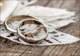  ?? FILE PHOTO ?? In the United States, marital status is indicated by both husband and wife wearing a wedding ring on their left ring finger.