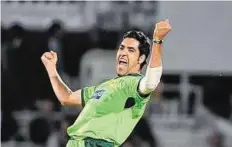  ??  ?? Umar Gul contribute­d two wickets and 49 runs as Pakistan put the South African Invitation XI under pressure at Buffalo Park.
Rex Features