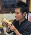  ?? PHOTO: EWAN FORDYCE ?? At work . . . University of Otago graduate and Taiwanbase­d whale researcher Dr ChengHsiu Tsai pictured in 2014 in his office with the bone of a baleen whale.