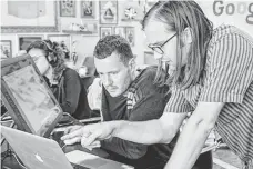  ?? CACO PARISE, GOOGLE ?? Designer Matthew Cruickshan­k, left, and team lead Ryan Germick collaborat­e on a Google Doodle in Sao Paolo.