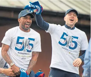  ?? ?? Greg Stewart (right) played his part in Rangers’ league win, and he’s seen celebratin­g the title success with striker, Jermain Defoe