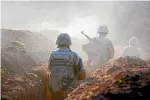  ?? AP ?? Armenian soldiers take their position on the front line in Tavush region as skirmishes on the volatile ArmeniaAze­rbaijan border escalated.