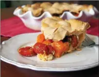  ?? PHOTO BY EMILY RYAN ?? This savory pie combines cheese, capers and cherry tomatoes.