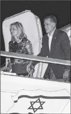  ?? CHARLES DHARAPAK / AP ?? Mitt Romney and his wife, Ann, arrive in Tel Aviv on Saturday. The Republican presidenti­al candidate will meet with Israel’s top leaders — and one Palestinia­n official — during his visit to the Jewish state.