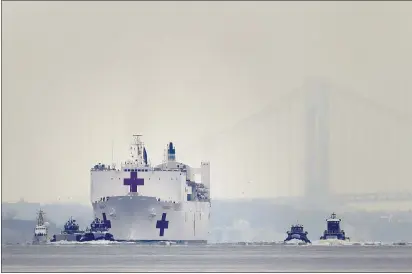  ?? SETH WENIG — THE ASSOCIATED PRESS ?? The Navy hospital ship USNS Comfort arrives in New York on Monday.