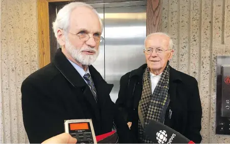  ?? BRETT BUNDALE / THE CANADIAN PRESS FILES ?? Former Knowledge House Inc. president and CEO Daniel Potter, left, speaks to reporters at the courthouse in Halifax in March. A Crown prosecutor called on the judge Tuesday to sentence Potter to 10-12 years for his part in a sophistica­ted...