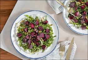  ?? PHOTO FOR THE WASHINGTON POST BY TOM MCCORKLE; FOOD STYLING BY GINA NISTICO FOR THE WASHINGTON POST Beet and Arugula Salad With Spiced Yogurt ??