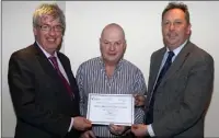  ??  ?? Jack Redmond of Camolin Community Developmen­t Associatio­n with John Carley and Padraig O’Gorman.