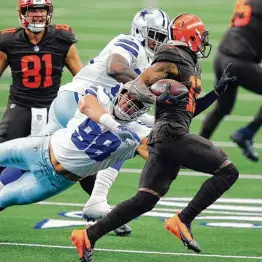  ?? Tom Fox / Dallas Morning News ?? The Browns’ Odell Beckham Jr. burned the Cowboys’ inept defense for three touchdowns Sunday, including this 59-yarder on a reverse to seal a 49-38 win.