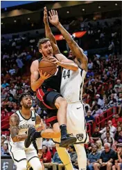  ?? MIAMI HERALD ?? Heat guard Goran Dragic, driving earlier this season in a game against the Nets, hasn’t had as much success against the Sixers.